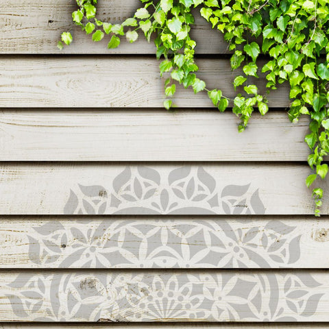 Asana Mandala Stencil painted onto a fence