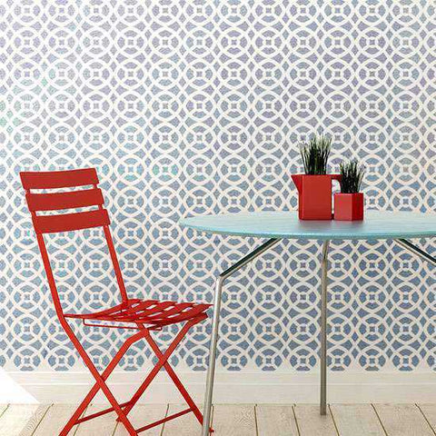 Arabesque Wall Stencils show on Wall with table.